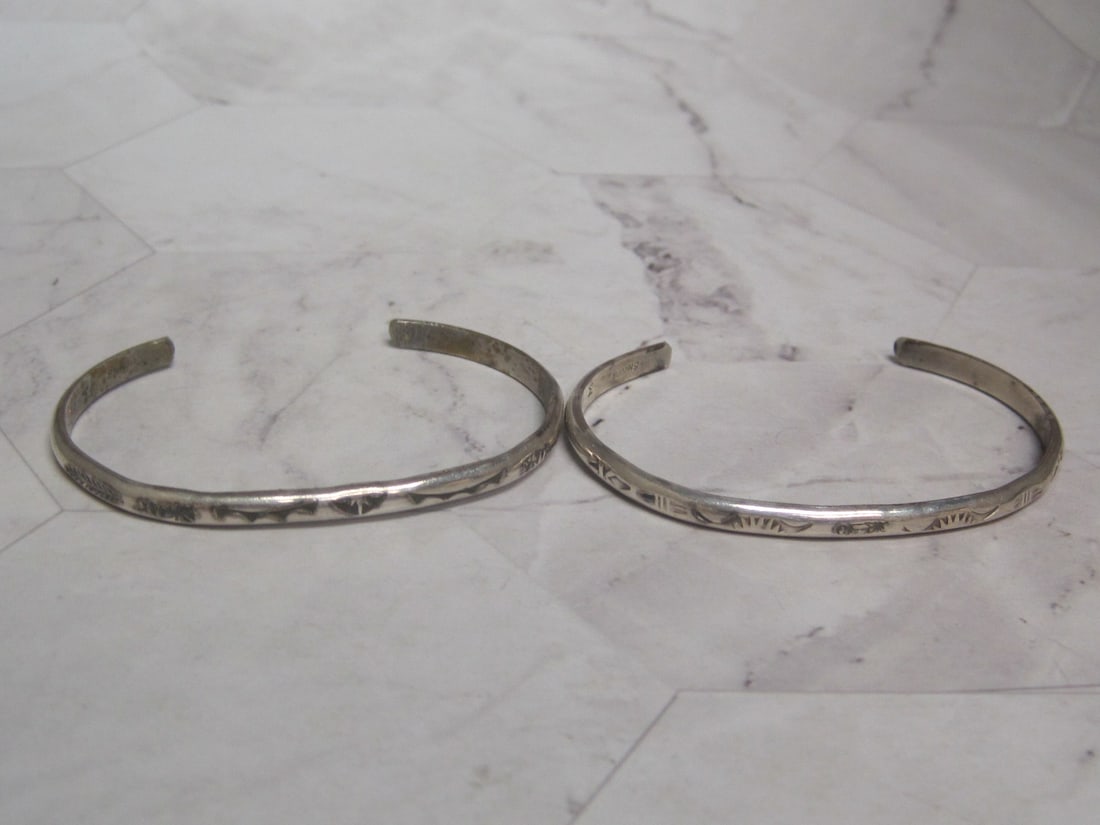 Pair of Sterling Silver Navajo Cuff Bracelets: .
