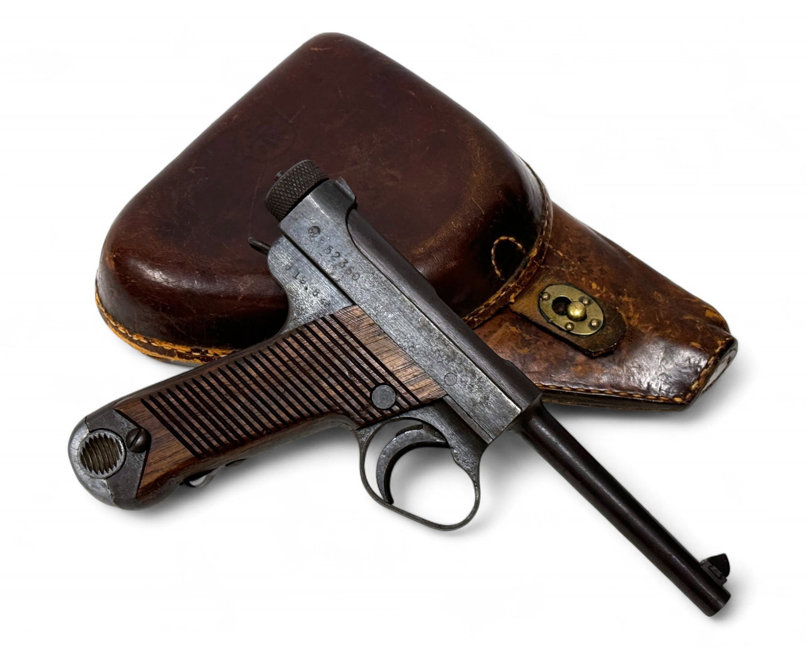 Excellent Japanese Type 14 8mm NAMBU Semi-Automatic Pistol with Matching Magazine & Holster: S# 52350 | 4.75" Barrel | 19.8 Showa | Toriimatsu (Nagoya) Second Series | Matching Serials on bolt and cocking knob | Comes with (1) Matching Magazine | Comes with an interesting holster that’s