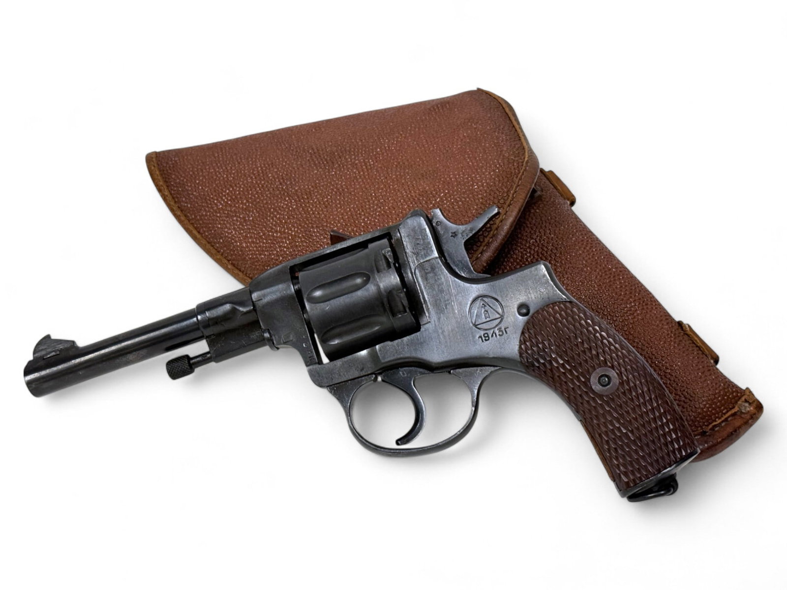Excellent Izhevsk 1943 WWII Russian Model 1895 7.62x38mmR NAGANT Service Revolver with Holster: S#: HK269, mfg. 1943 | 4.5" Barrel | 7-shot | SA/DA | This is the only revolver that can be suppressed | Comes with a nice Russian Nagant holster with nice markings |||| Condition: Excellent. 100% Ars