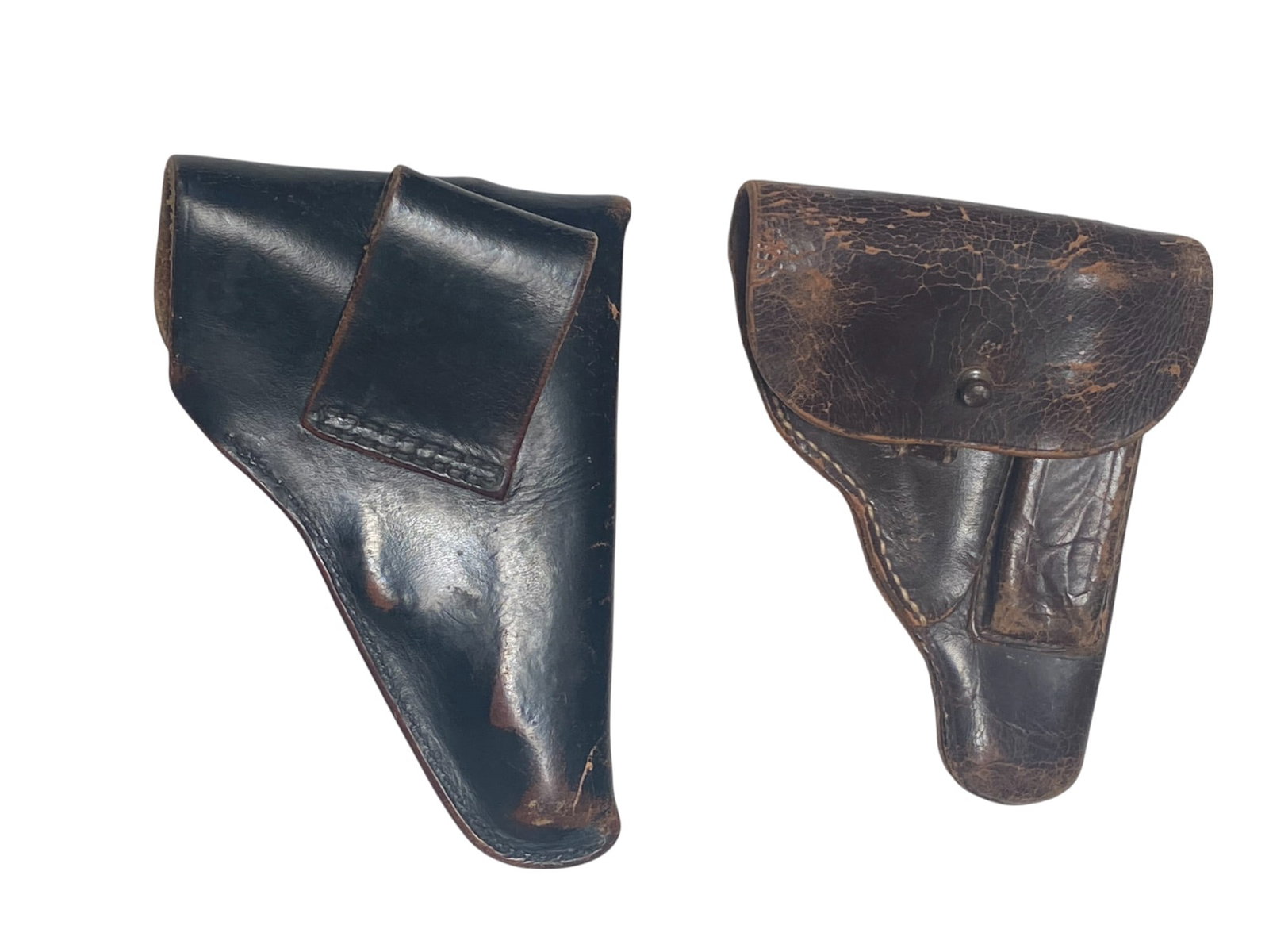 (2) Rare WWII German Small Pistol Holsters: One holster is possibly for a Sauer 38H or Mauser HSC and has written on it "Genschow & Co 1940". The other holster is unknown.