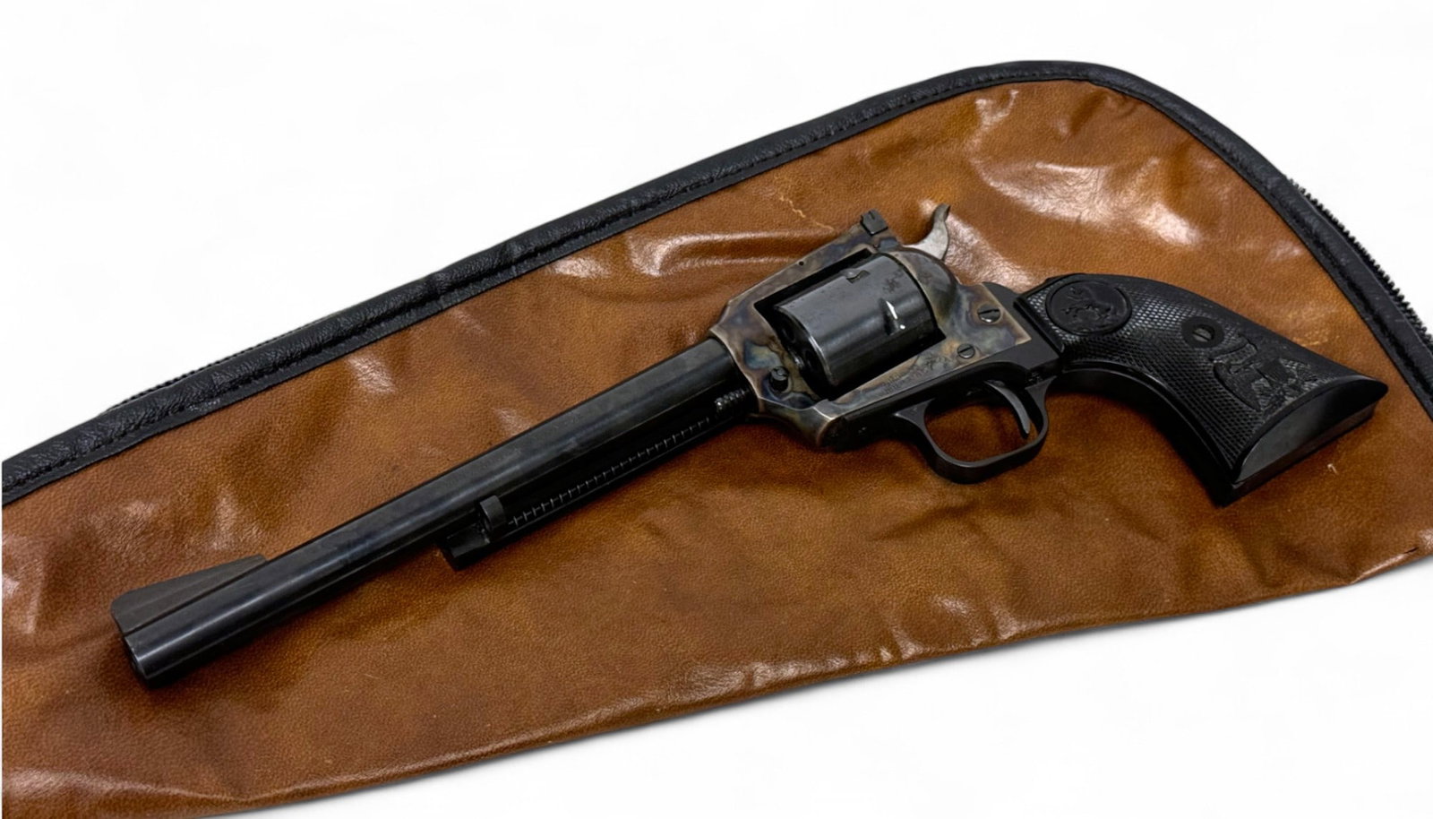1972 Colt New Frontier Buntline SAA .22 MAG 7.5” Revolver: S#: G55911 Mfg. 1972 | 7.5” Barrel | .22 WMR Cylinder | 6-Shot, SA |||| CONDITION: Very good. 98% Original CCH Finish on frame with some surface rust. Cylinder is in excellent condition with nic