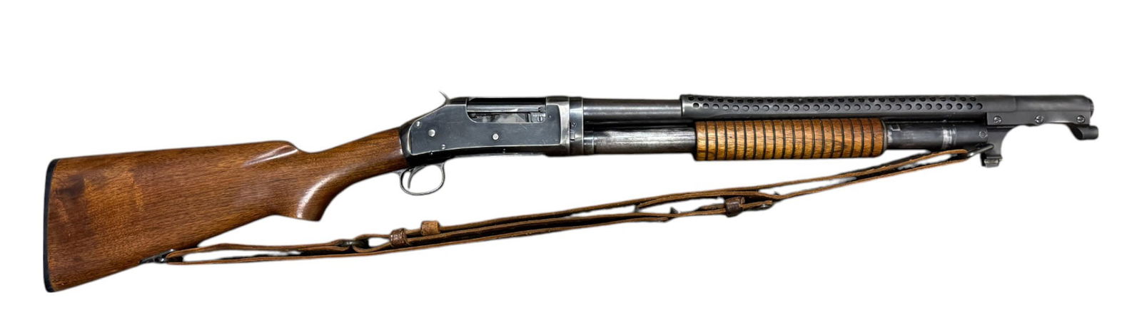 WWII 1945 Winchester Model 1897 12 GA. Slamfire Action Trench Shotgun: S#: 919514 Mfg. 1945 | Matching on Receiver and Barrel | “ Takedown Barrel with Full Choke and 2-3/4” Chamber | In trench gun format with a nice heat shield with bayonet lug and equipped w