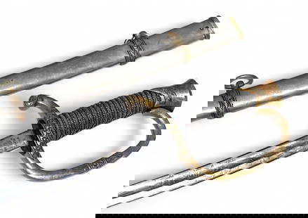 US Model 1872 Artillery Officers Sword by J.H Wilson Philadelphia PA: Sword Features 2 Swords, a Shield, and Flag on the Blade. The sword is also marked US on the blade. | 32" Blade, 34" Overall | Good Condition