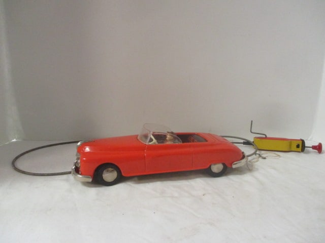 Vintage West Germany Arnold Cable Control Orange Convertible Tin Car with Driver (1 of 10)