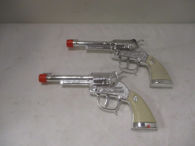 Pair of Old Hubley Toy Cap Guns: .