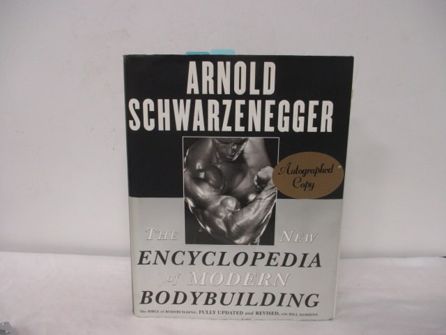 Autographed Copy of  "Arnold Schwarzenegger The New Encyclopedia of (1 of 4)