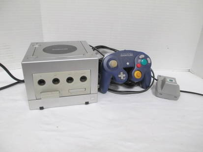 2001 Nintendo Game Cube with controller and Nintendo 64 Rumble Pak: Game Cube Model OOL-101- Nintendo 64 Model NUS-013 includes "The Legend of Zelda Collectors Edition" Game Disc