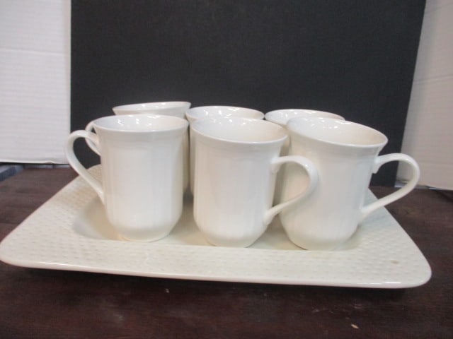 6 Mikasa Ultima Plus "Antique White" Cups and Nora Fleming Cream Platter: (6) 4 1/2" cups, 14 3/4" x 10 1/2"