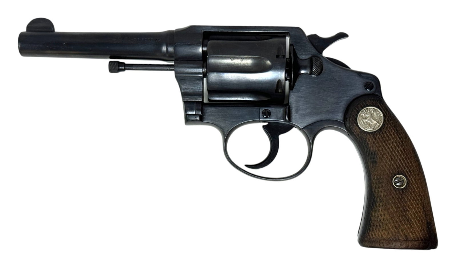 1930 Colt Police Positive .38 SPECIAL Revolver: S#: 335054, matching on frame and cylinder | Mfg. 1930 | 4" Barrel | 6-shot SA/DA | Colt medallion wood-checkered grips |||| CONDITION: Very good/restored. 98% reapplied blue finish. Markings are visi