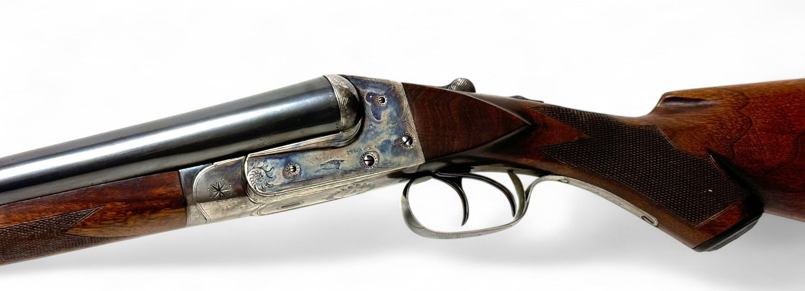 Excellent 1902 Ithaca Gun Co. 12 GA. Crass Grade 2 SXS Double Barrel Hammerless Engraved Shotgun: S#: 76594, matches on receiver and forend - Mfg. 1902 | 30" Solid Rib Smokeless Powder Steel Barrels | Measurements: Trigger-to-heel measures 13.5", trigger-to-toe measures 14" | 1.75" drop-of-comb, 3