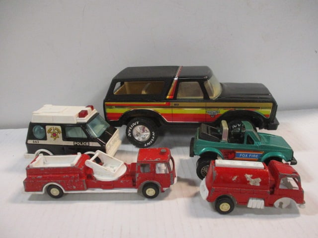 Nylint Bronco (10"), Tootsie Toys Foxfire (5"), Buddy L Police Car &: 2 Fire Trucks (1 firetruck needs wheels)
