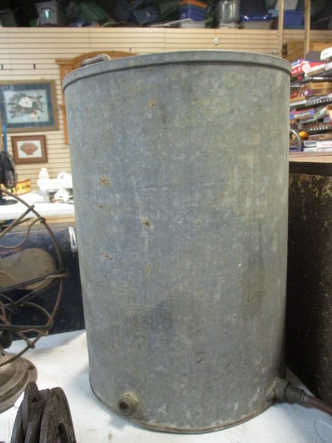 Vintage Metal Moonshine Still with Plastic Jug: 14" x 20 1/4", rust and wear