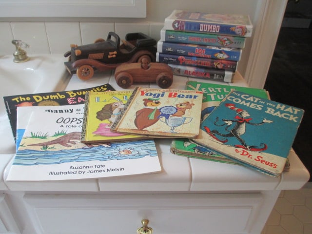 Children's Books, Disney VHS Movies and Wooden Toy Cars: See pictures and preview for titles and condition