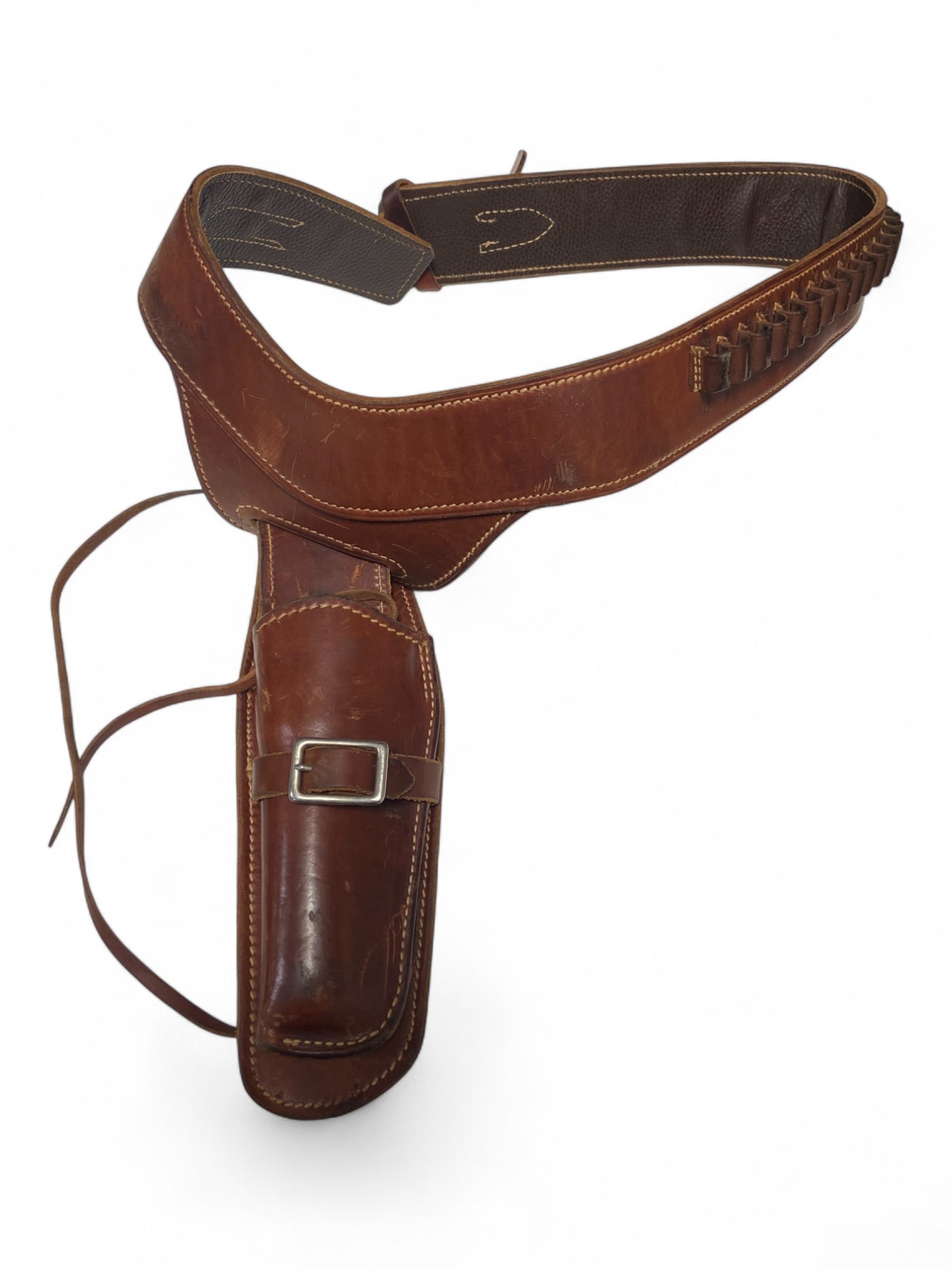 Excellent The George Lawrence Co. 78X #661 Left Hand Leather Cowboy Holster Rig with Cartridge Belt: Excellent quality. See photos for more details and all markings. 78X and #661. Left Handed. Appears to have Nickel Plated buckles. Size: Medium, 41" Length Belt. Cartridge slots appear to be for large