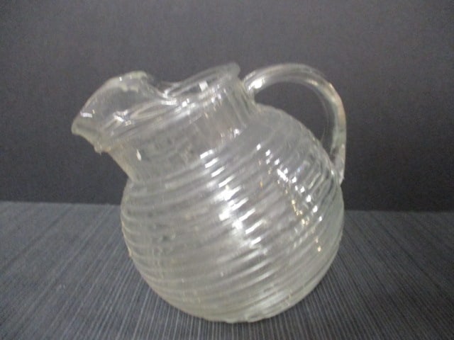 Vintage Clear Glass Manhattan Ball Tilted Pitcher.: 6'' Tall.