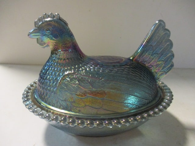 Unmarked Indiana Glass Iridescent Carnival Glass Hen on Nest Covered Dish: 7" long, blue glass base, Indiana Glass per consigner note