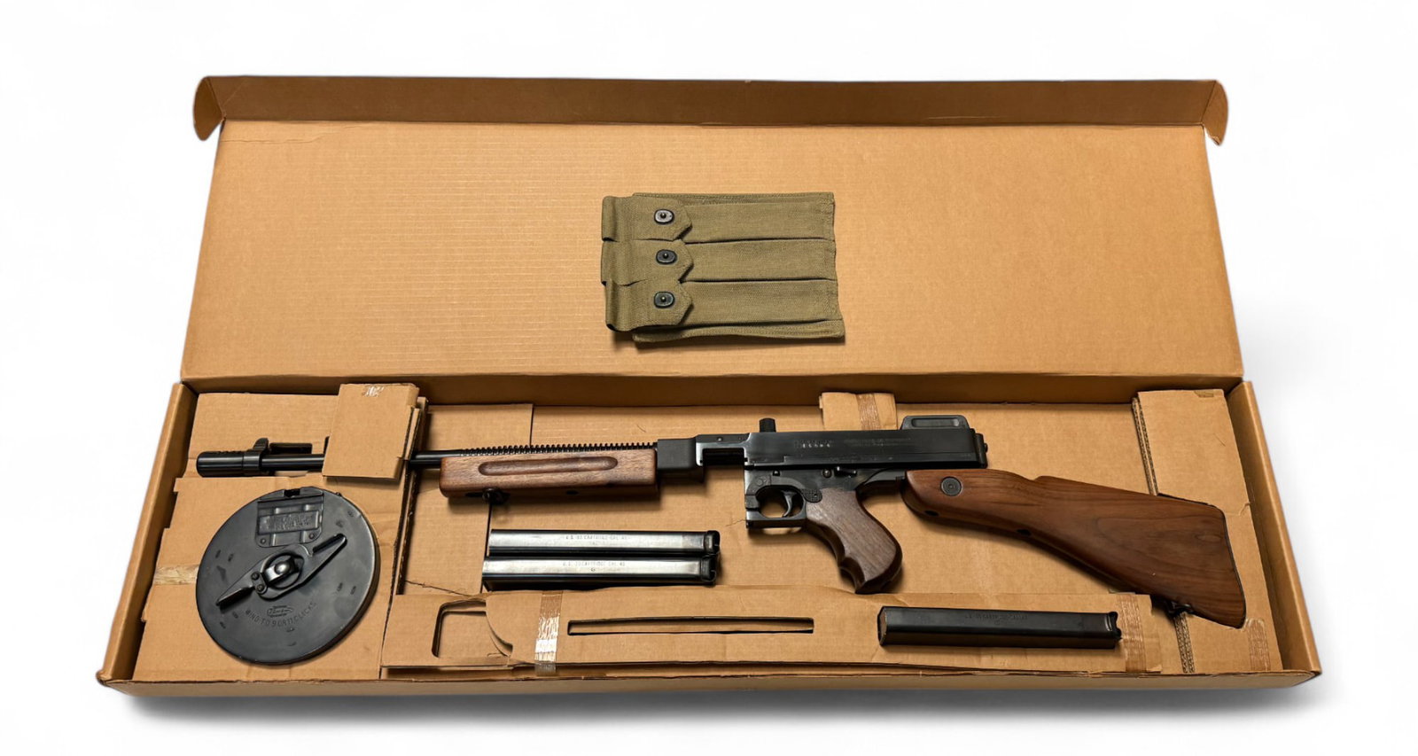 NIB 1987 Preban West Hurley Thompson Model 1927 A1 Deluxe .45 AUTO Carbine with Extras!: S#: 15604 | Mfg. 1987 in West Hurley, NY | 16” Barrel | Deluxe model with upgraded features such as the Lyman rear ladder aperture sight, pinned compensator, and also sports the desirable detach