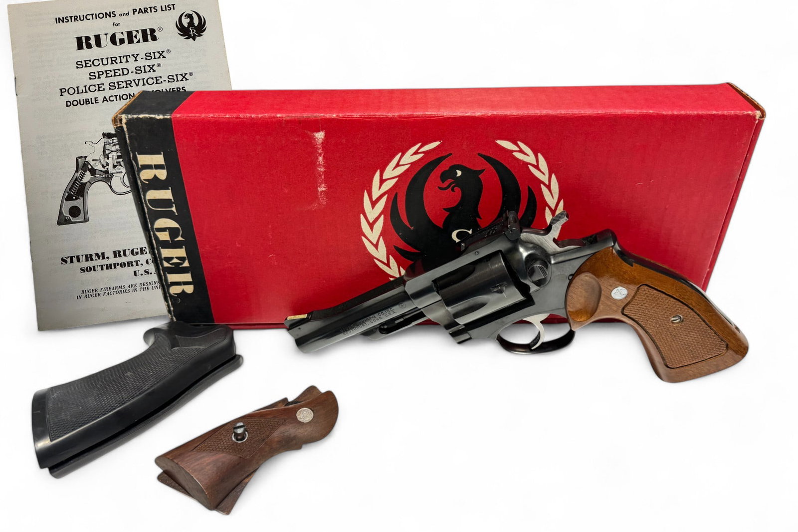 LNIB 1977 Ruger Security-Six .357 MAG. 4” Revolver in Box: S#: 153-17698 | Mfg. 1977 | 4” Barrel | Comes in factory red Ruger box with no label. Comes with (3) pairs of grips, original wood medallion grips, large frame wood checkered grips, and Pachmayr
