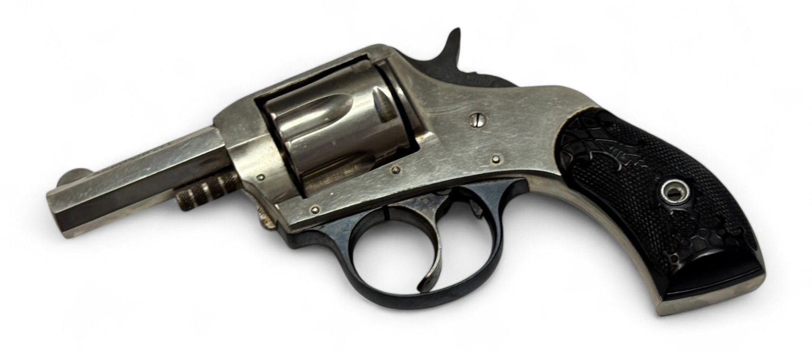 H&R “The American Double Action” .32 S&W Revolver: S#: 2214 Matching on both grips | 2.5” octagonal barrel | 6-Shot, SA/DA |||| CONDITION: Excellent. 98% nickel finish. Visible markings. Nice blue finish on trigger guard and hammer. Nice CCH fin