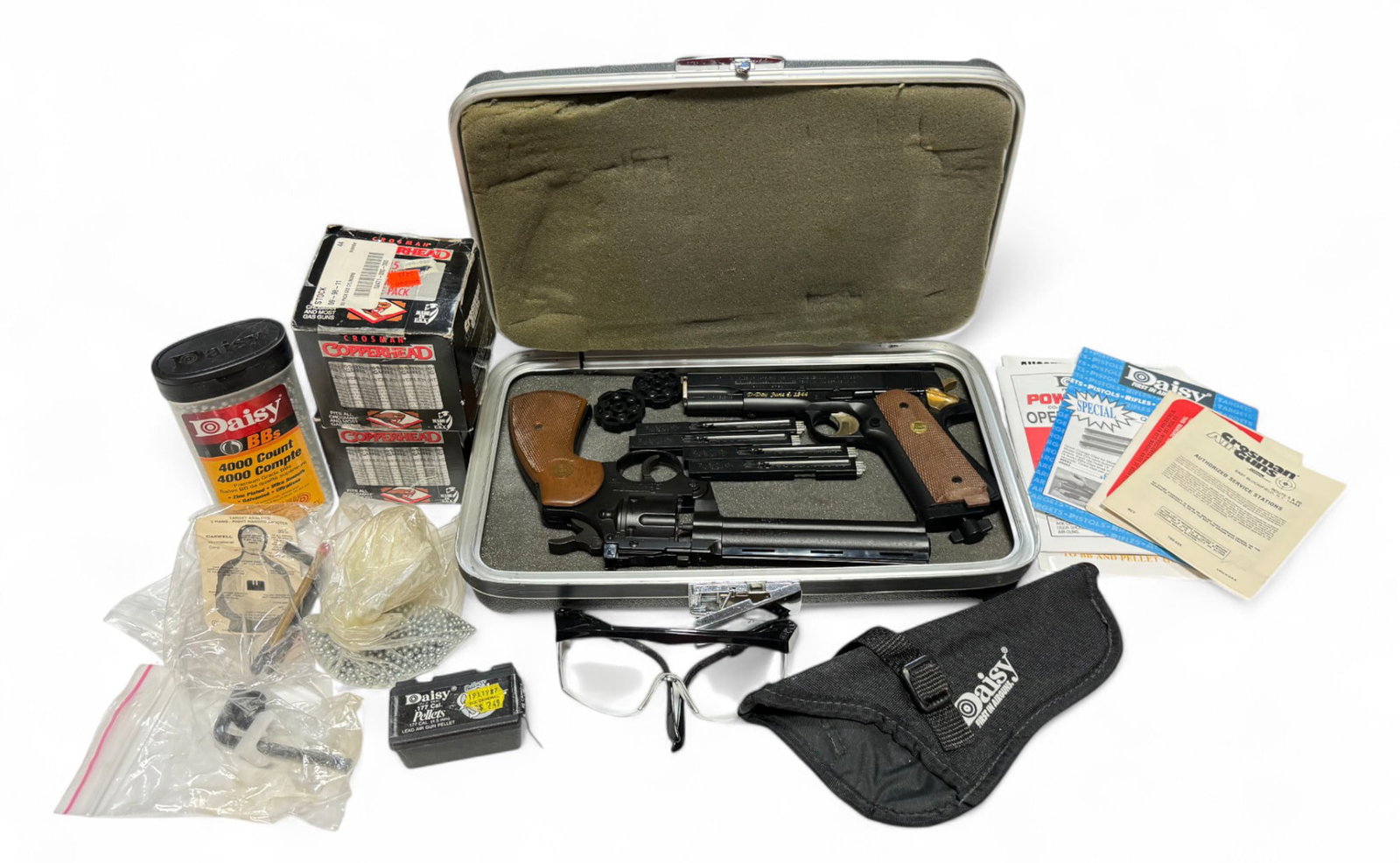Daisy Powerline 45 Lmtd. Ed. D-Day 1 of 5000 Pistol & Crosman 357 six CO2 Air Guns with Accessories: Completely loaded lot here with a foam padded hard case. Multiple quick load stick magazines for the pistol and quick load cylinders for the revolver. (25) Unused CO2 canisters. Loads of various BBs/P