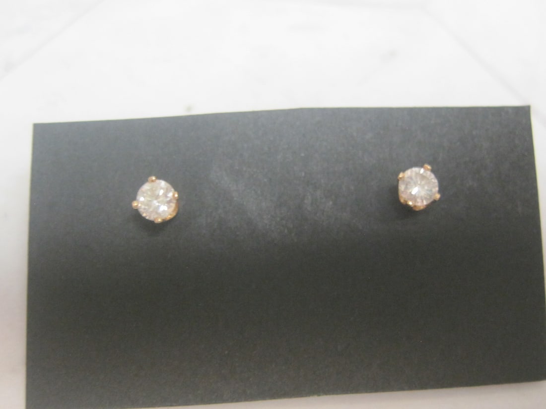 14k Gold Diamond Stud Earrings: .33 Carat Total.