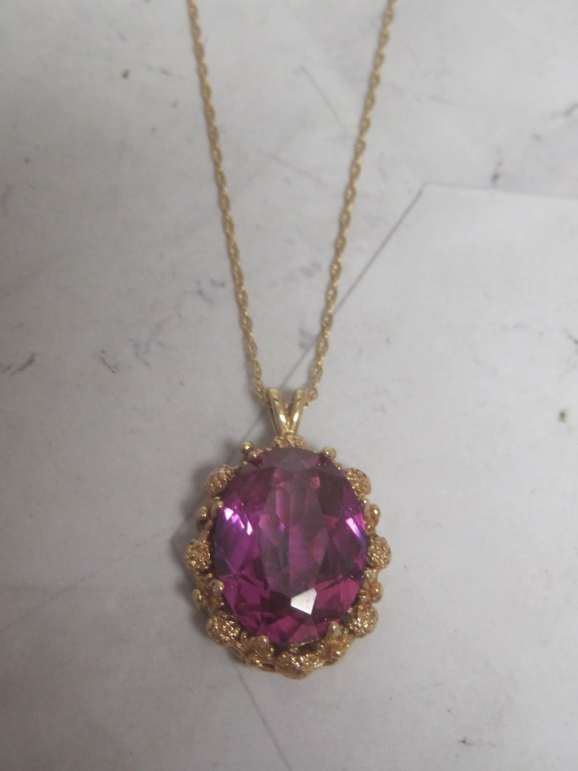 19" 14k Gold Chain with Amethyst Pendant: 9 Carat Amethyst Stone. Weighs 5.4 grams