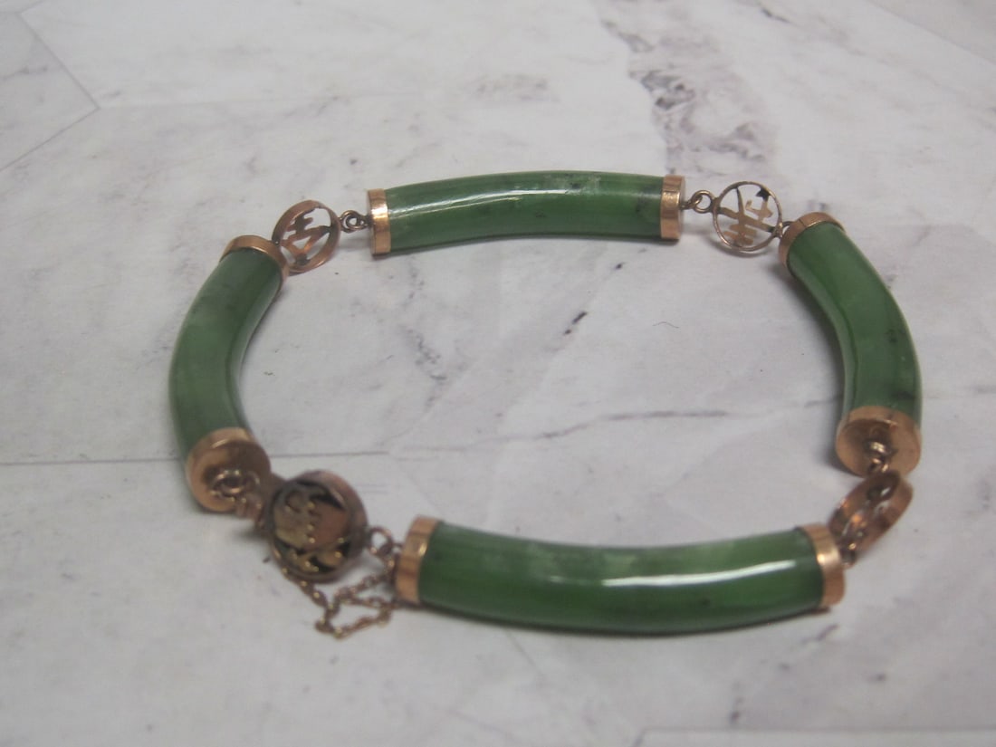 14k Gold Chinese Jade Bracelet: Curved Jade and Fancy Characters in links. Weighs 19.5 grams