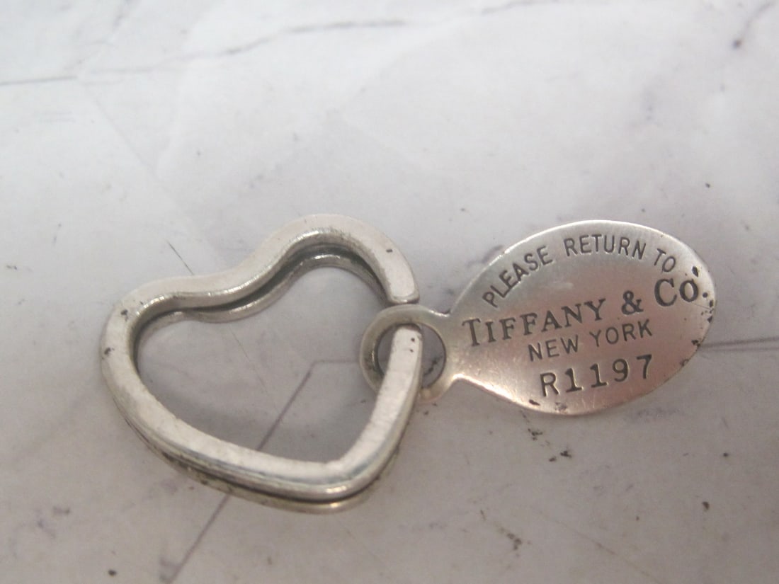 Tiffany & Co. Sterling Silver Heart Key Ring: Guaranteed Genuine. Weighs 7.5 grams