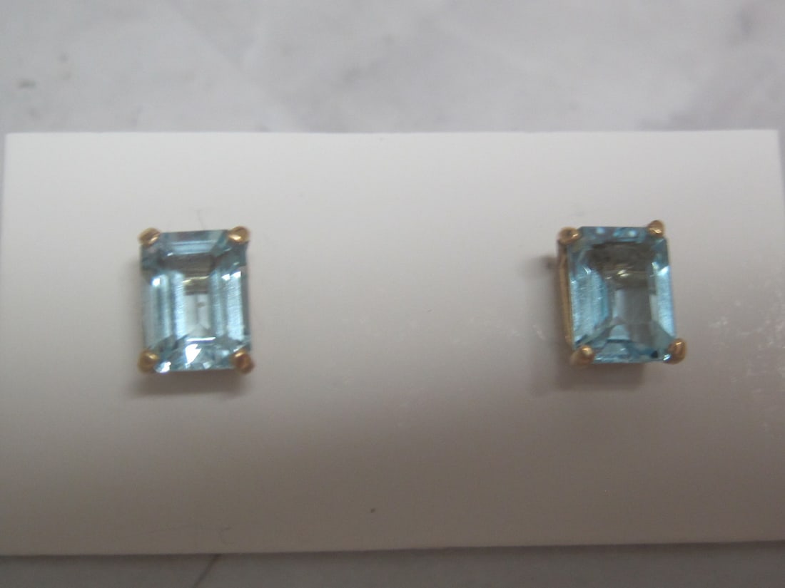14k Gold Blue Topaz Stud Earrings: Rectangular Gems. 3 Carats. Weighs 2 grams