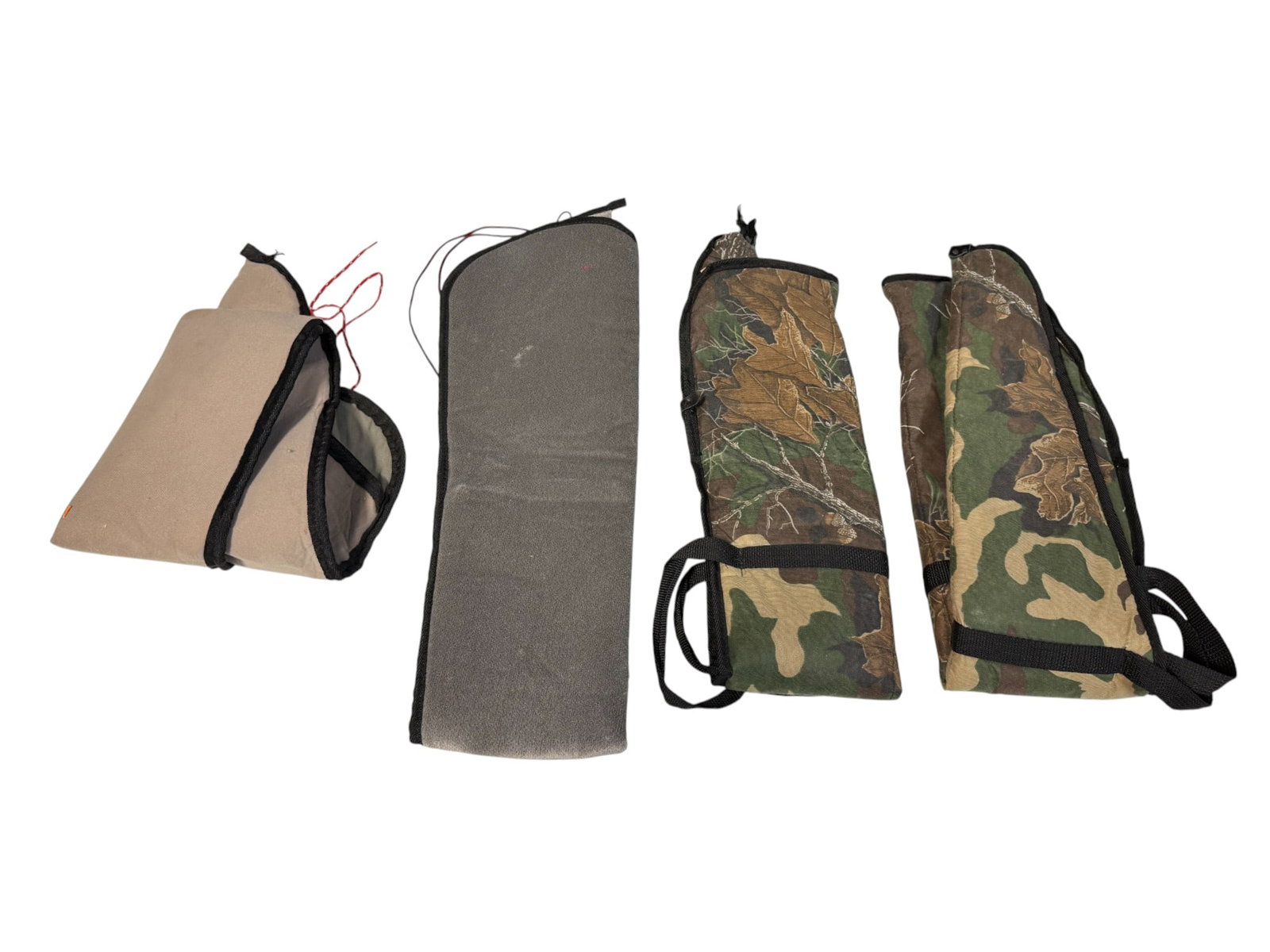 (4) Padded Soft Gun Cases: Range from 42” to 52” long. Cases show some wear and usage, but for the most part, in good condition. Will Ship.