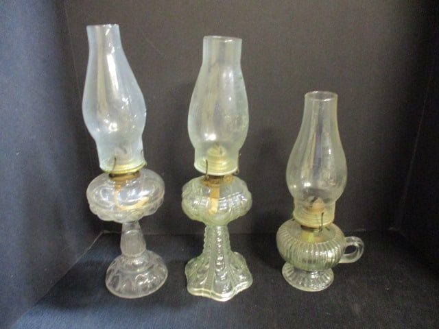 Two Clear Glass Post Oil Lamps and Finger Hold Oil Lamp: 15 1/2"h, 16"h, 12 1/2"h