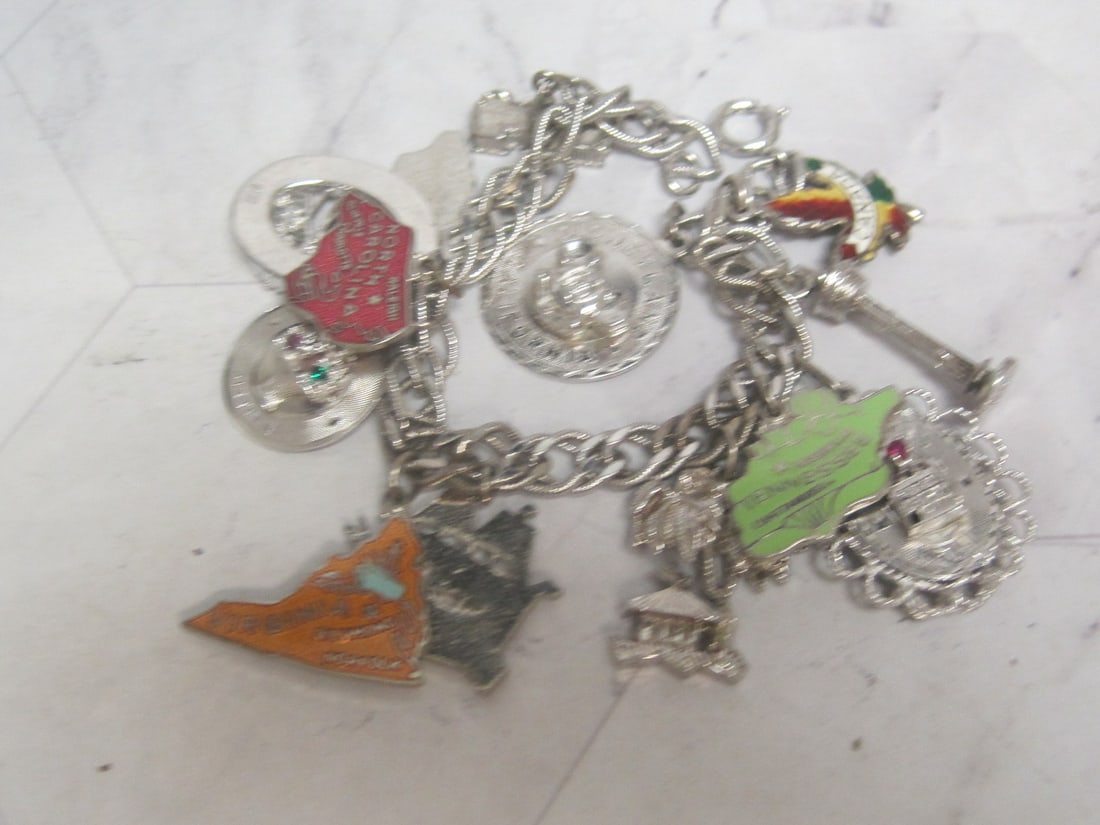 Vintage Sterling Silver Charm Bracelet with 9 Sterling Charms: Weighs 53.7 grams
