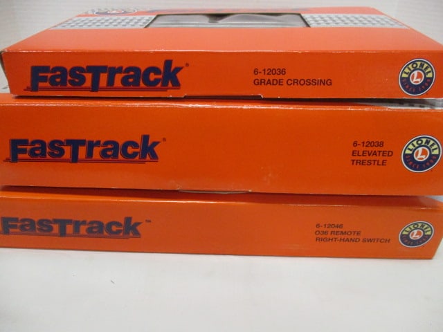 3 Boxes of Lionel Fast Track Sets - #6-12036 Grade Crossing, #6-12038 Elevated (1 of 7)