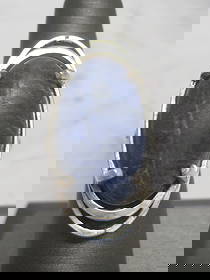 Sterling Silver Sodalite Ring: Oval Cabachon in Mid-Century Modern Design setting. Size 7 1/2