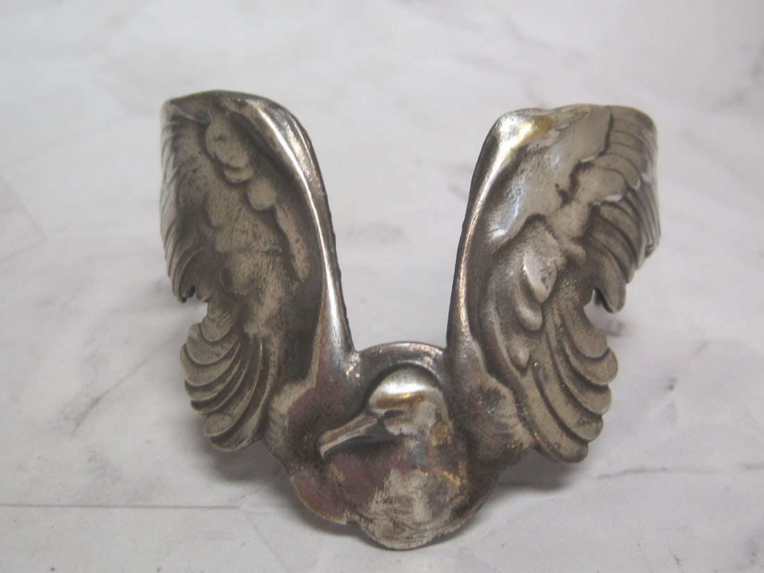 Silver plate Bird in Flight Cuff Bracelet: Adjustable.