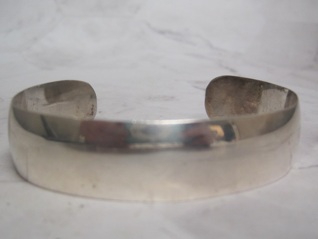 Sterling Silver Cuff Bracelet by Mary Kessler: Adjustable. Weighs 33 grams