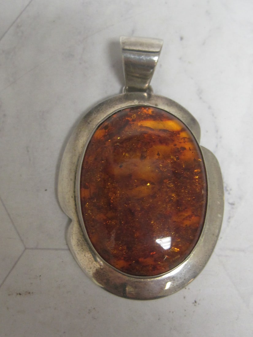 Sterling Silver Amber Pendant: .