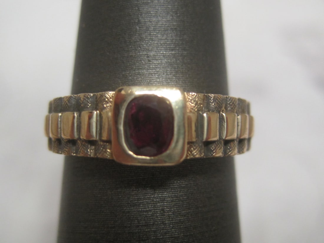 14k Gold Ruby Band Ring: Rolex Design made to make Presidental Model Band. 1/2 Oval Ruby. Size 6. Weighs 4 grams
