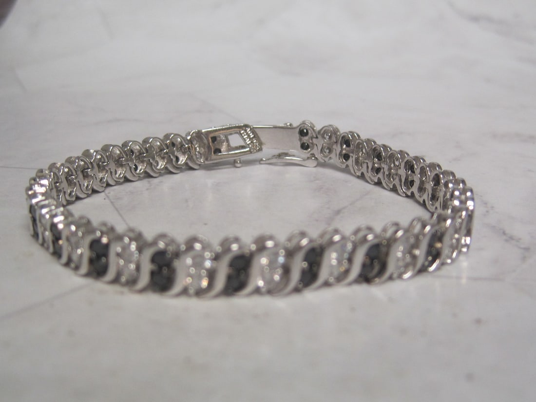 6 1/2" Sterling Silver Black & White CZ Bracelet: .