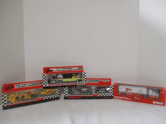 3 New Old Stock Matchbox Super Star Team Convoy and Transporter and: 1 New Old Stock Racing Champions "1993 Hooters NASCAR" Racing Team Transporter