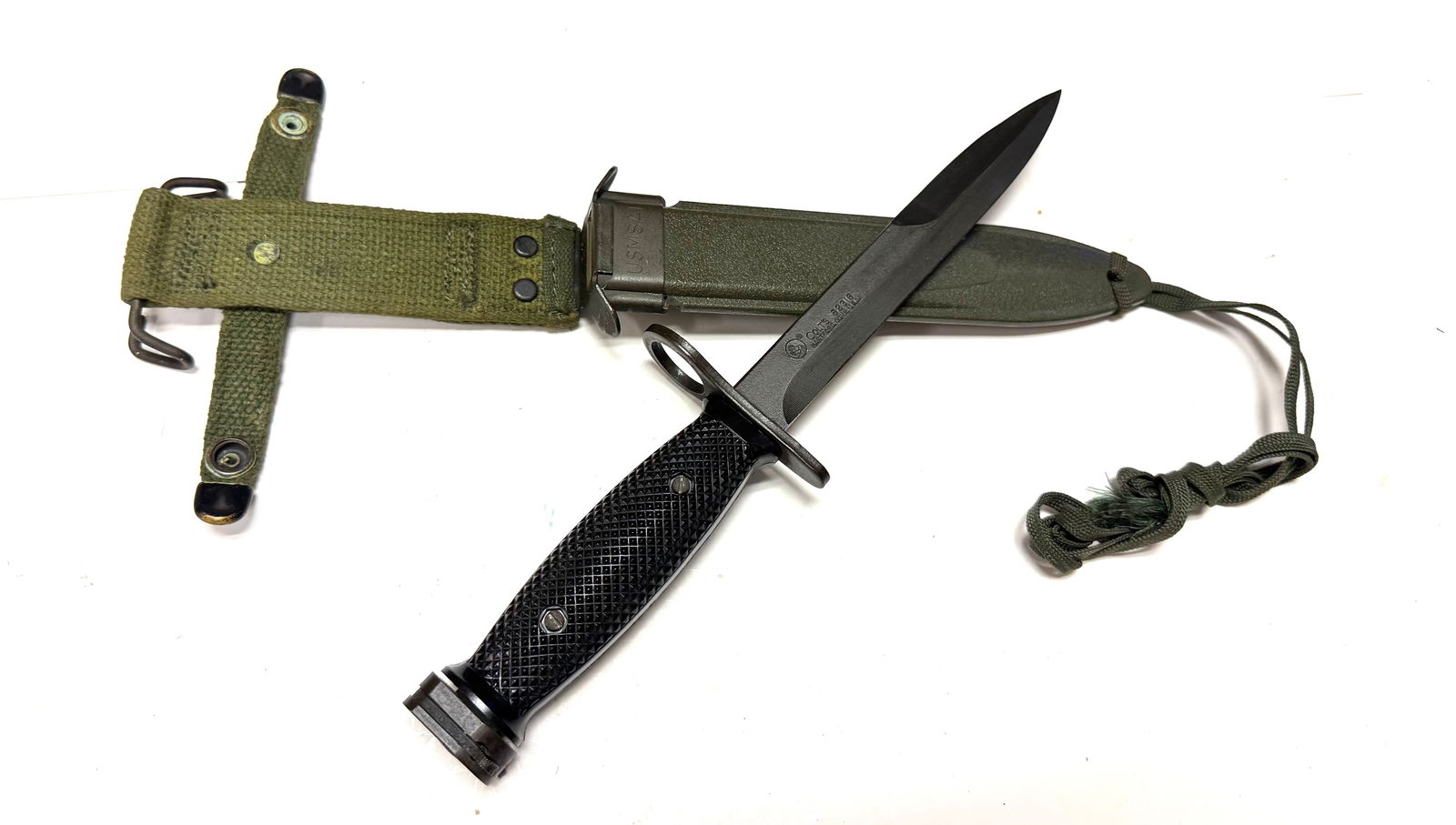 RARE & MINT US Issued (Imperial) Colt 62316 M7 Bayonet with Original USM8A1 Scabbard: Excellent condition with beautiful finish on blade. Nice & sharp. Scabbard is excellent. Mint example. Imperial made 30,000 Colt M7's. Blade is marked by a circle with a horse inside and Colt's 62316