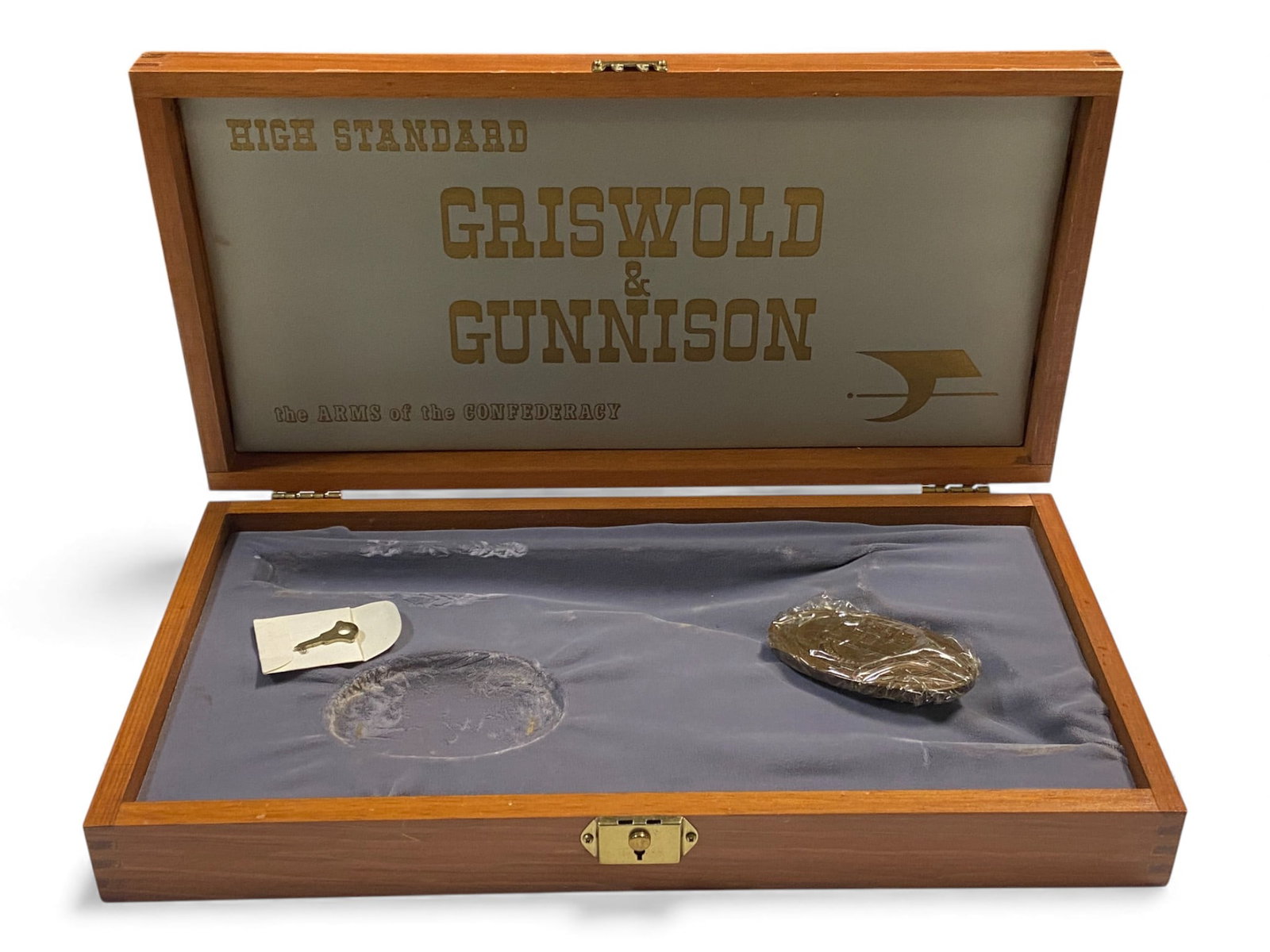 High Standard "Griswold & Gunnison" Commemorative Revolver Box with Key, and Belt Buckle: See photos for exact details, and condition.
