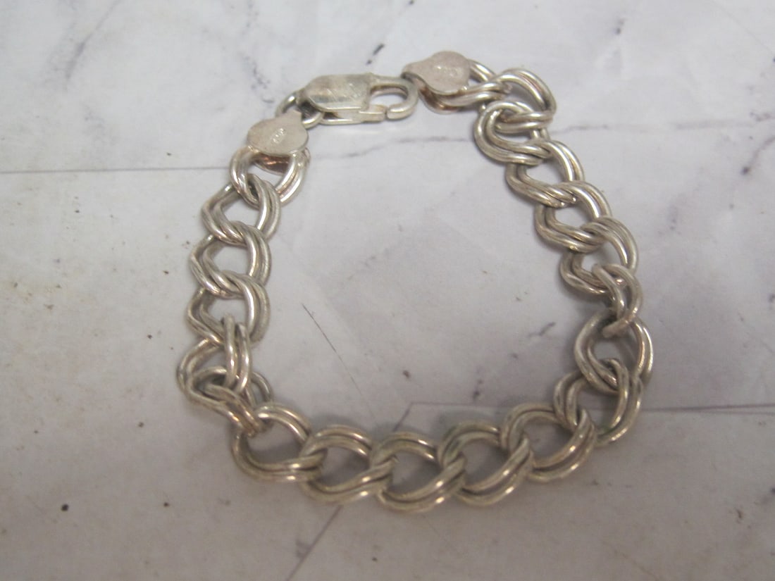 6 1/2" Sterling Silver Link Bracelets: Weighs 15.4 grams