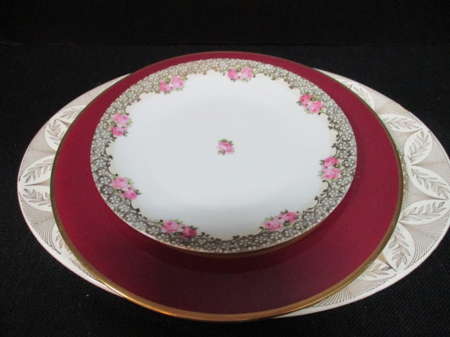 Three Handpainted Porcelain Plates: .