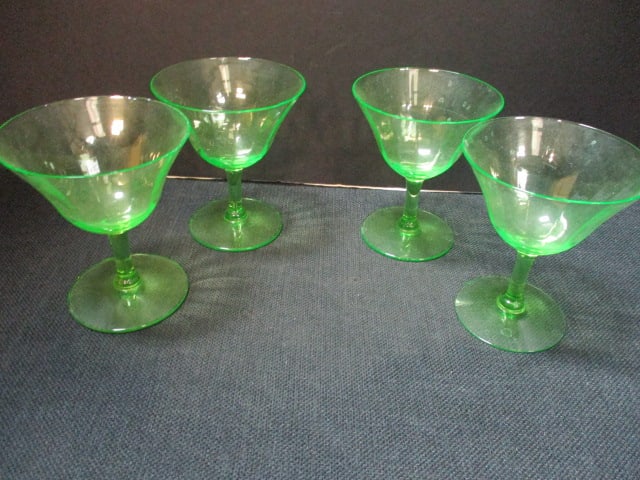 Four Vintage Green Uranium/Vaseline Glass Champagnes: 4 1/4"h, one has smoothed chip, few flea bites