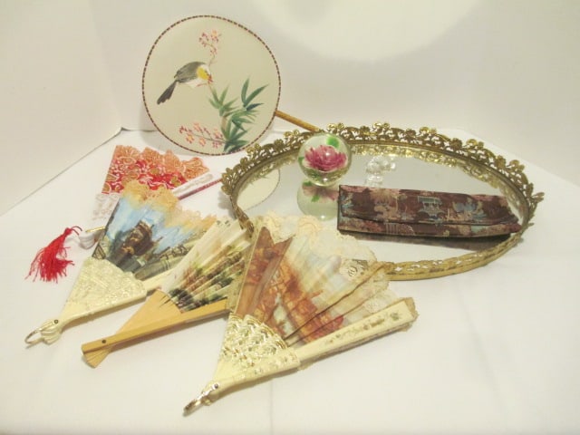 Gold Tone Mirrored Vanity Tray, Hand Fans, Goebel Crystal Elephant Figure and: Peony Design Art Glass Paperweight
