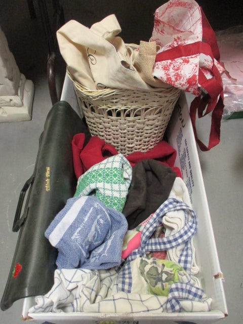 Lot of Dishtowels, Aprons, Fabric Bags, Blanket, Wicker Trash Can, etc.: see pictures and preview for selection and condition