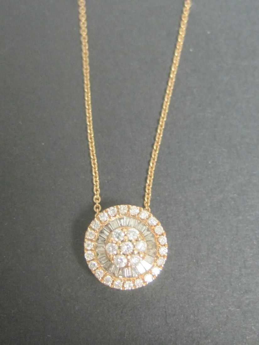 14k Rose Gold Diamond Pendant & Chain: Weighs 2.5 grams, 16" chain, Round & baguette diamonds totaling approx. 1/2 carat