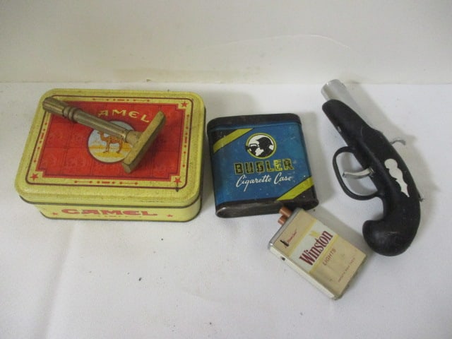 Novelty Items Grouping-Winston Lighter, Bugler Cig. Case,: Brass Razor, Flintlock Cap Gun, Camel Tin