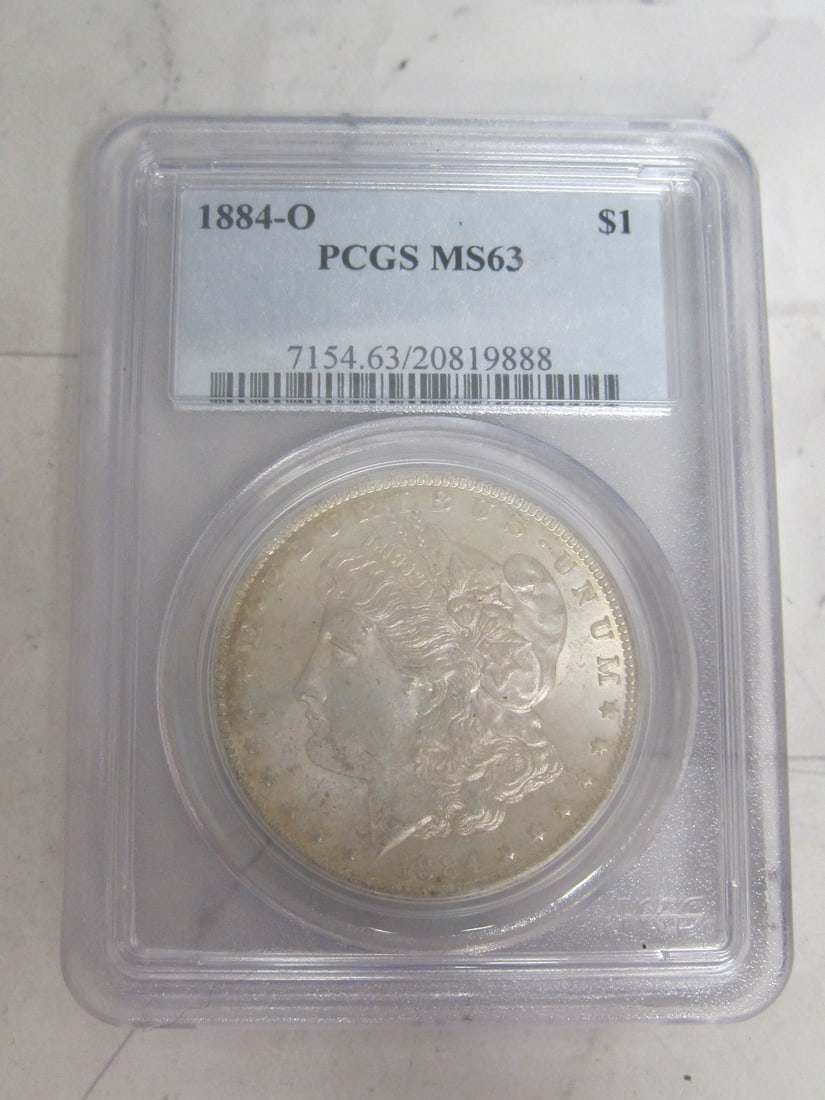 1884 O UNC. Morgan Silver Dollar: Graded MS63, Certified & Graded by PCGS